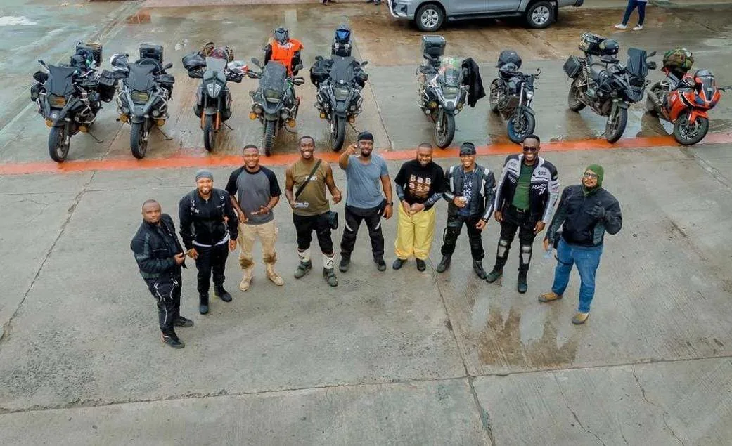 Aerial shot of the crew and ten adventure bikes lined up at the ferry crossing